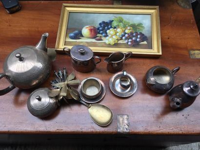 null Set composed of a small tea set, hammered silver metal, tea, sugar bowl, milk...