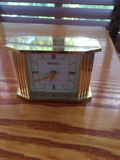 null REIKO brass alarm clock with a tide clock