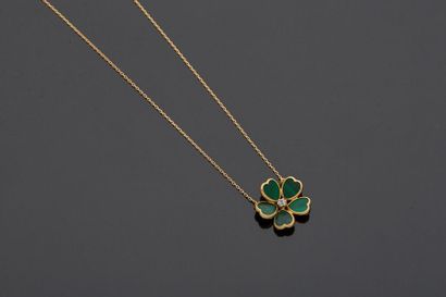 null Necklace in yellow gold, 18k 750‰, adorned with a central flower-shaped element...