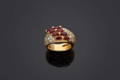 null Ring in yellow gold, 18k 750‰, decorated with two lines of shuttle-cut rubies...