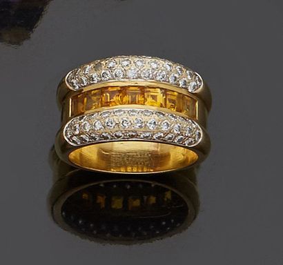 null 18k yellow gold rush ring, 750‰, set with a line of yellow sapphires (heated)...