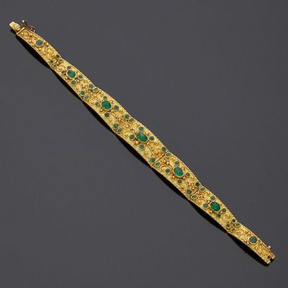 null Bracelet en or jaune, 18k 750‰, composé de plaques articulées en dégradé, décorées...