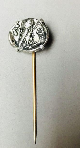 null Metal tie pin, adorned with a piece (reproduction) depicting Athena and her...