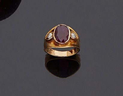 null Ring in 18k yellow gold, 18k 750‰, decorated with an oval-shaped treated ruby...