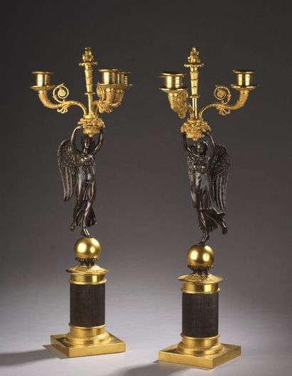 null PAIR OF CANDELABERS in gilded bronze and patinated bronze decorated with a Renowned...