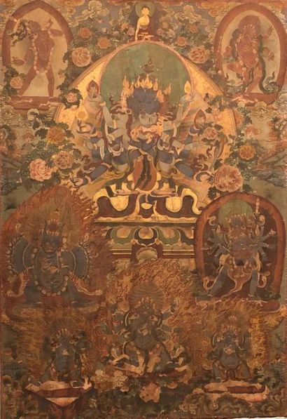 null Tangkha (détrempe sur toile) figurant un yidam enlaçant sa parèdre ; il est...