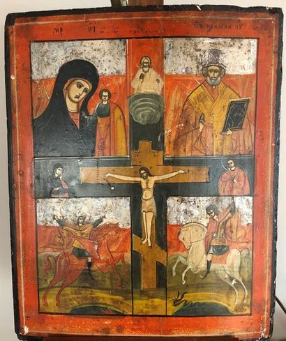 null Icône en bois peint à décor d'une crucifixion encadrée de personnages bibliques
Petits...
