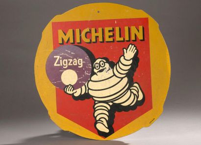 null Plaque en isorel Michelin Zig Zag 
Diam : 62 cm, manques