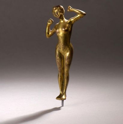 null Sculpture figurant un nu aux bras levés, bronze doré, usures
H : 15 cm