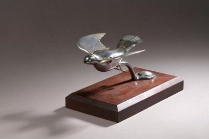 null "Flying Mascotte Ltd", 
Rare oiseau à ailes mécaniques articulées, métal chromé
L...