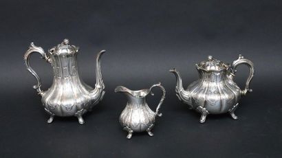 null 
Tea-coffee service in silver plated metal with engraved decoration of foliage...