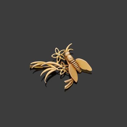 null Broche en or jaune, 18k 750‰, représentant un insecte sur des branchages fleuris,...