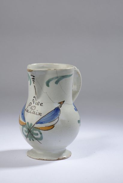 null NEVERS, late 18th century

REVOLUTIONARY WATER POTTLE with a handle with polychrome...
