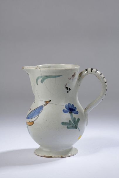 null NEVERS, late 18th century

REVOLUTIONARY WATER POTTLE with a handle with polychrome...