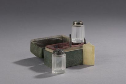 null WRAPPING in fine green shagreen containing two ink bottles, a tablet and a pencil...