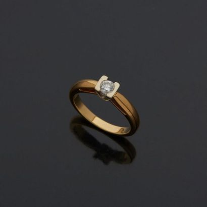 Solitaire in two-tone gold, 18k 750‰, set...