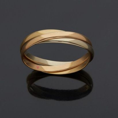  Three gold bracelet, 18k 750‰, made of three intertwined rings. 
Inner d. 5,70 cm...