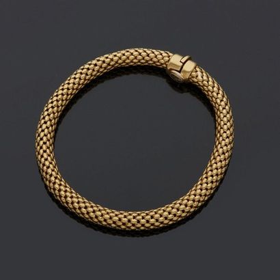 null Bracelet en or jaune, 18k 750‰, en tube souple, fermoir à cliquet.

L. 20 cm

Poids...