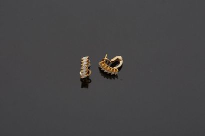Pair of 18k yellow gold ear clips, 750‰,...