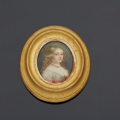 Oval miniature on enamel, three-quarter portrait...