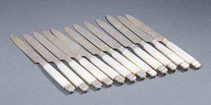null 12 fruit knives with silver blades, 2nd title 800 ‰, and mother-of-pearl handles....