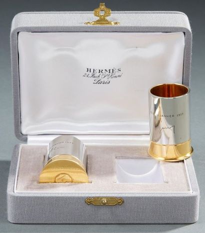 null HERMÈS Paris by RAVINET d'ENFER

Two silver and gold metal shots in the form...