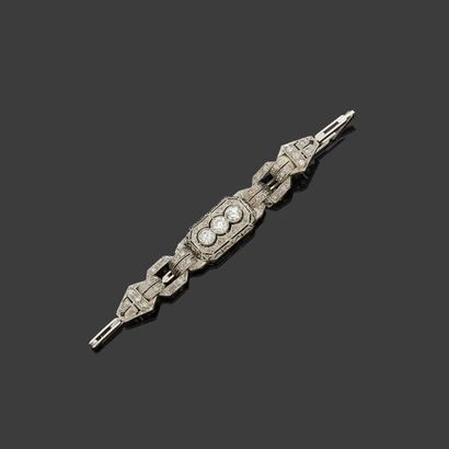  Platinum bracelet, 850‰, articulated with openworked geometric links, set in its...