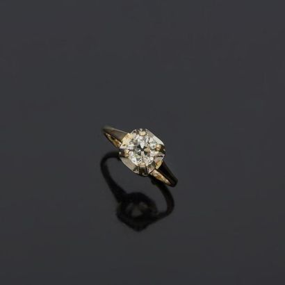  Solitaire in white gold, 18k 750‰, set with an antique cut cushion shaped diamond....