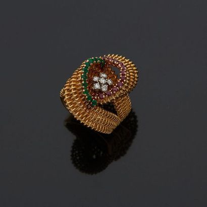  Ring in yellow gold, 18k 750‰, and platinum, 900‰, composed of two volutes woven...