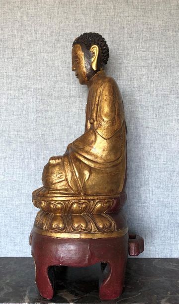 null Bouddha
En bois polychrome sculpté
Restaurations et petits manques
H : 84 c...