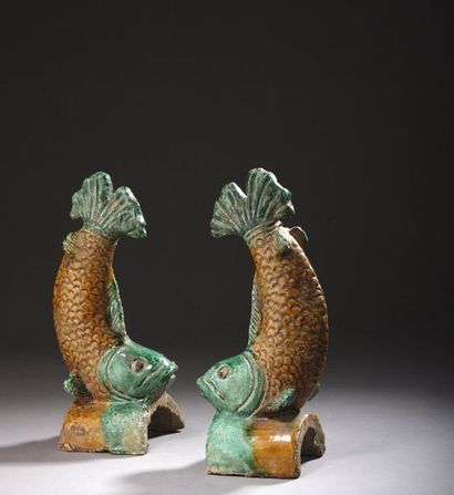 null PAIR OF TILES MADE OF green and yellow glazed terracotta in the shape of carps.

China,...