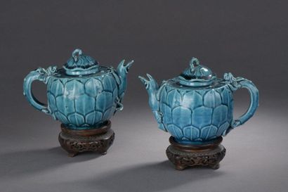 null Pair of stoneware pourers in turquoise blue enamelled stoneware, shaped like...