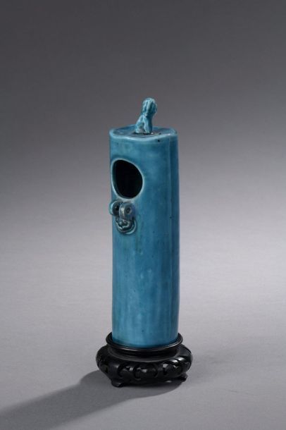 null SUSPENDING VASE in turquoise blue enamelled stoneware, one opening at the front...
