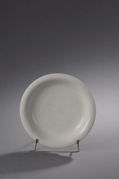 null ASSEMBLY in monochrome porcelain with thick glaze, called "blanc de Chine".

China,...