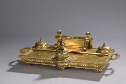 null DESK INK in bronze decorated with gadroons, half pearls and shells. 

Signature...