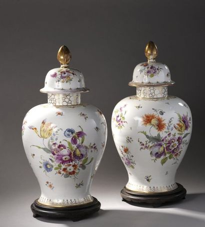 null PAIR OF POTICHES covered in porcelain with polychrome decoration of flower throws....