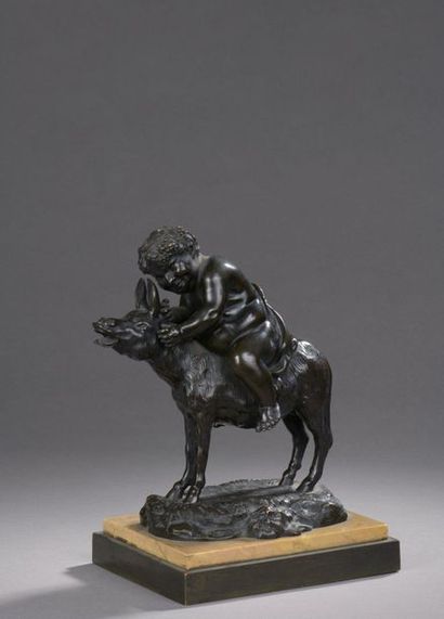 null STATUTE in patinated bronze representing Bacchus on a donkey.

Base in yellow...