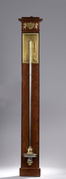 null Mercury BAROMETER in flamed mahogany veneer and engraved brass plate.

Signed...