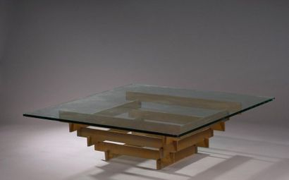 null Low square low table with thick glass top. Varnished brass base.

Work from...