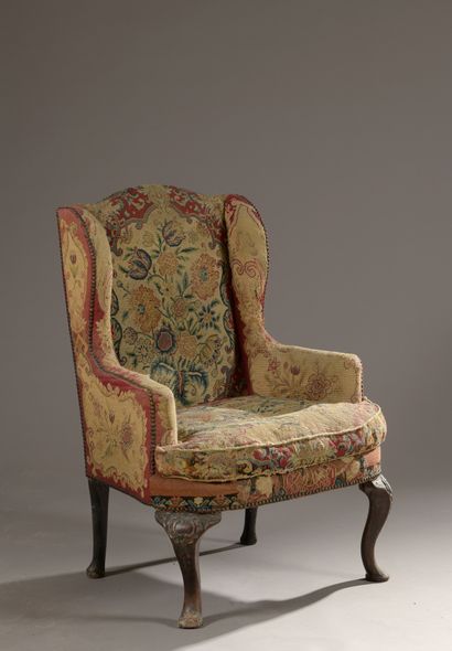null FABRIC with flat backrest with walnut lugs. Curved legs, the front ones carved...
