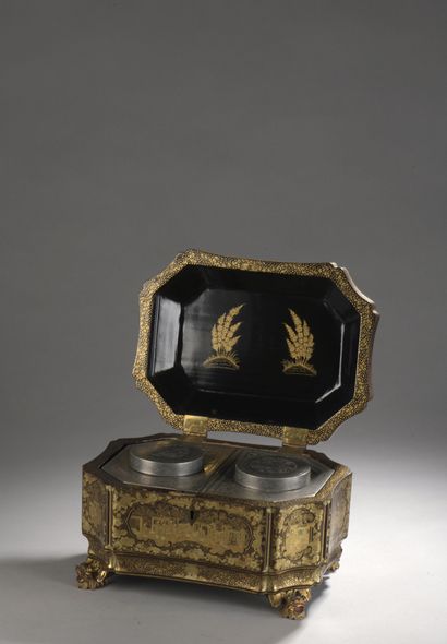 null Rectangular TEA BOX with cut sides, made of black lacquered wood with gold decoration...