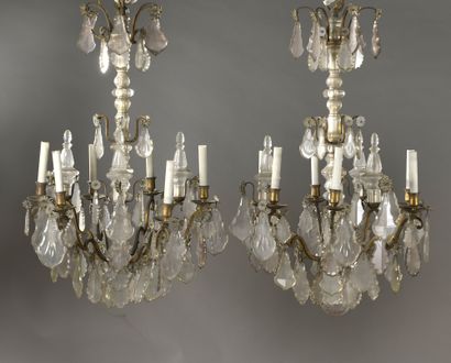 null PAIR OF CHANDELS with six bronze chandeliers decorated with plates and cut crystal...