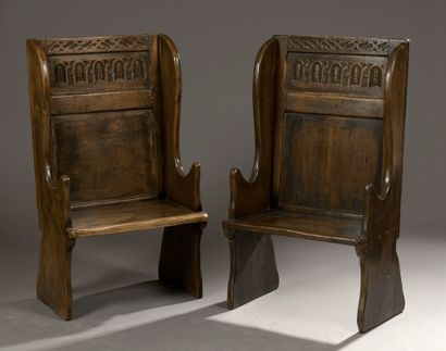null Pair of solid oak FALLS with flat backs with panels carved with interlacing...
