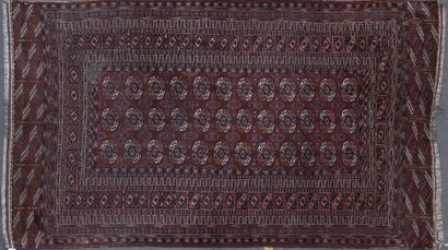 null BOUKHARA CARPET with classic gulh decoration on a wine lees background. 


Task.

285...
