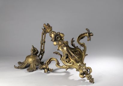 null Gilt bronze chandelier with four arms of light with foliage around an openwork...