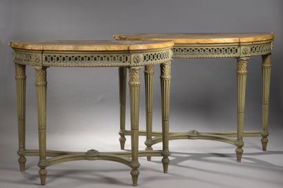 null Pair of half-moon CONSOLES in cream-coloured wood with pale green rechampi....