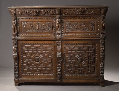 null RIBBANK in oak molded and carved with putti, foliage rinceaux and lion mittens....