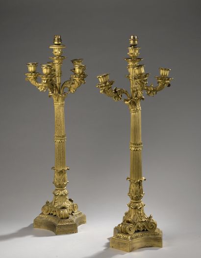 null PAIR OF Six-light Candelabra in bronze and gilded brass with acanthus leaves,...