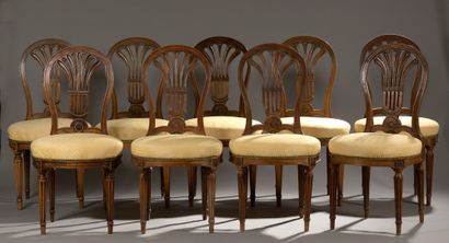 null CONTINUOUS NINE Moulded beech dining room chairs with openwork back with fluted...