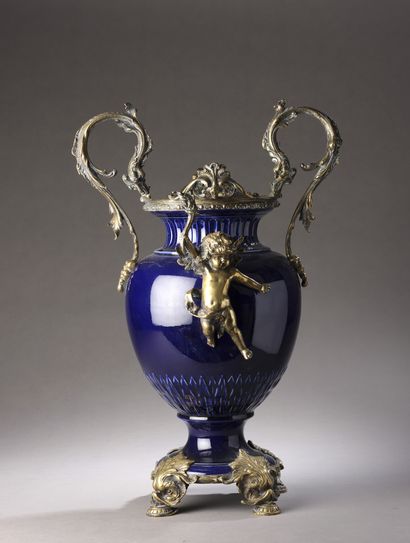 null VASE ovoid with pedestal in fine Sarreguemines night blue earthenware with ormolu...
